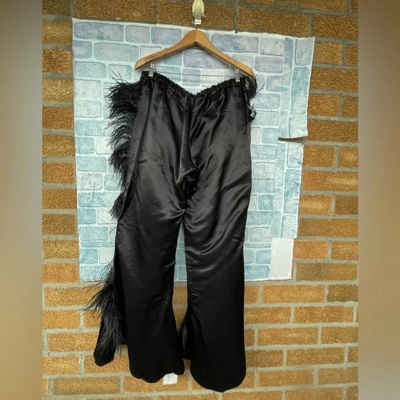 MARQUES' ALMEIDA
Feather-embellished kick-flare satin trousers size 10 - Picture 9 of 16
